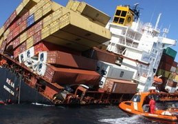 Large Container Ship Leans To One Side As Containers Look To Be Tumbling Sidways