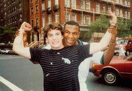 Mike Tyson poses with a young Robert Downey, Jr